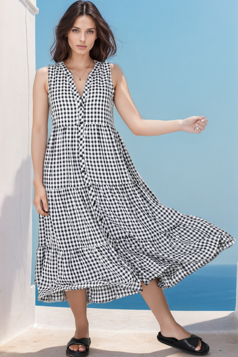 A woman wearing a Gingham Dress in Black from Salty Crush