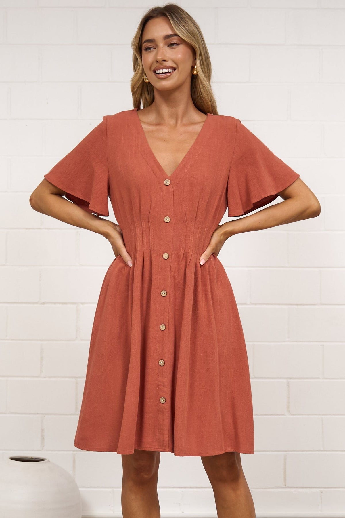 Karin Mini Dress - V Neck Flutter Sleeve Mini with Decorative Front Button Placket in Rust